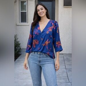 Blue and floral ModCloth Satin flutter sleeve top size Small